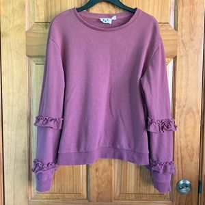 Women’s size small REV Revelation mauve sweatshirt with sleeve ruffle detail